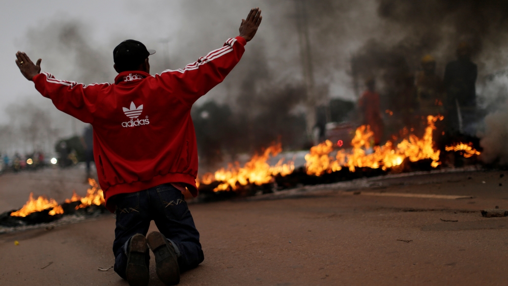 
The unrest comes against amid worsening conditions across Brazil [Ueslei Marcelino/Reuters]
