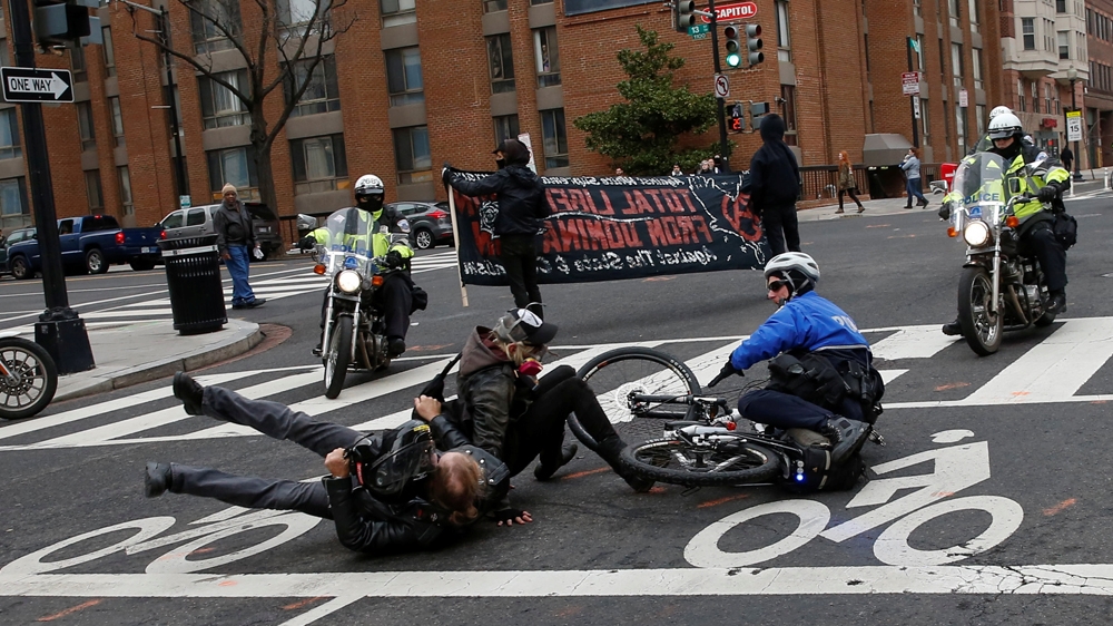 Police have been accused of using excessive force and breaching regulations during the anti-Trump rally [File: Adrees Latif/Reuters]