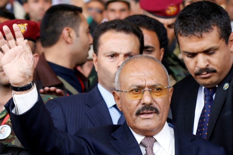 FILE PHOTO Yemen''s former President Ali Abdullah Saleh gestures to supporters as he arrives to a rally held to mark the 35th anniversary of the establishment of his General People''s Congress party in