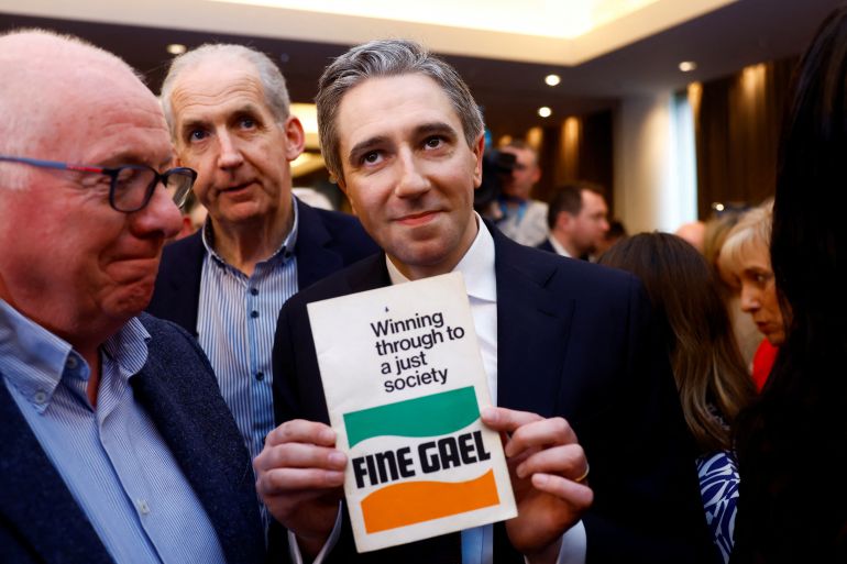Ireland's Minister for Higher Education, Simon Harris, poses after being announced as the new leader of Fine Gael at the party's leadership election convention, in Athlone, Ireland