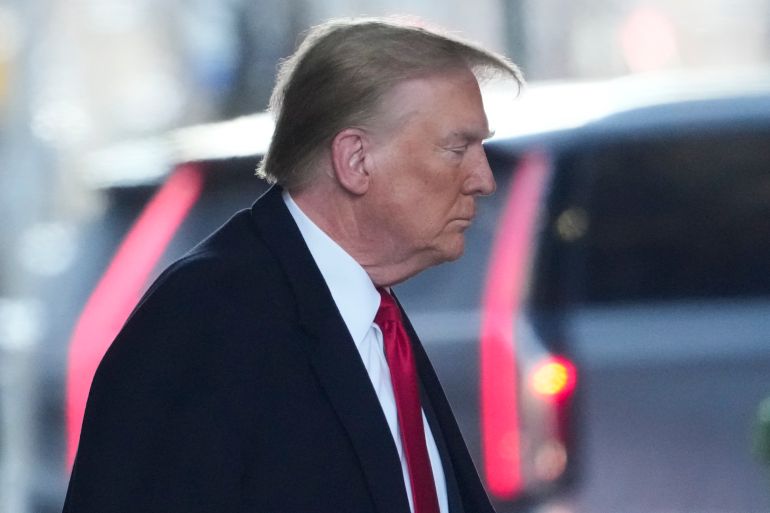 Republican presidential candidate former President Donald Trump leaves his apartment building in New York