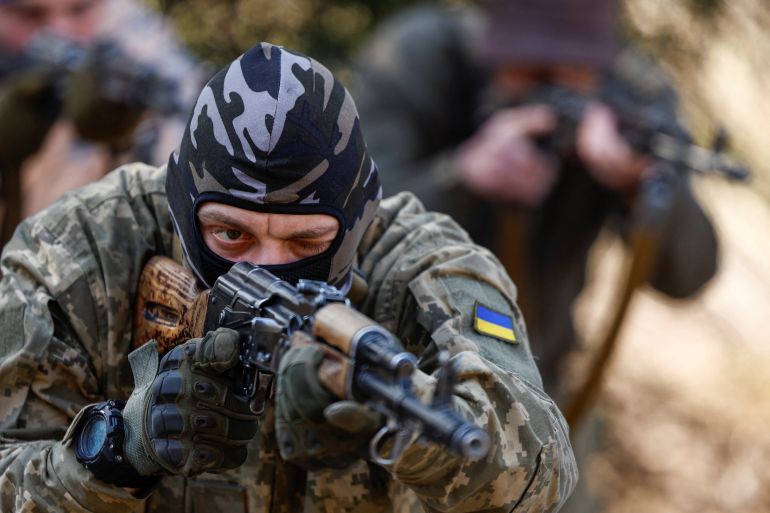 A potential recruit who aspire to join the 3rd Separate Assault Brigade of the Ukrainian Armed Forces takes part in a testing basic military course, amid Russia's attack on Ukraine, in central Kyiv, Ukraine March 27, 2024. REUTERS/Valentyn Ogirenko