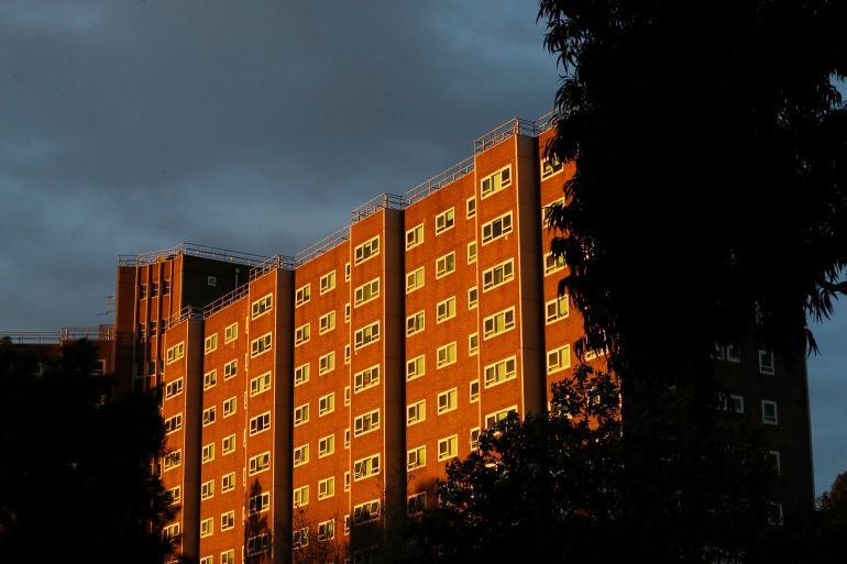 towers can be seen illuminated by the sun